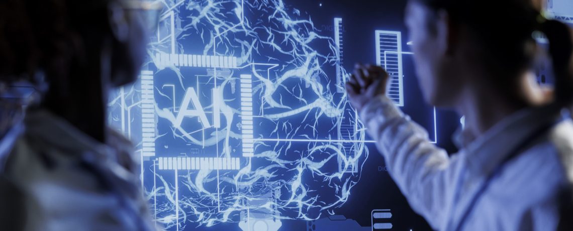 Computer scientists brainstorm ways to use AI cognitive computing to extract usable information from complex data. Data center employees implement artificial intelligence to process massive datasets