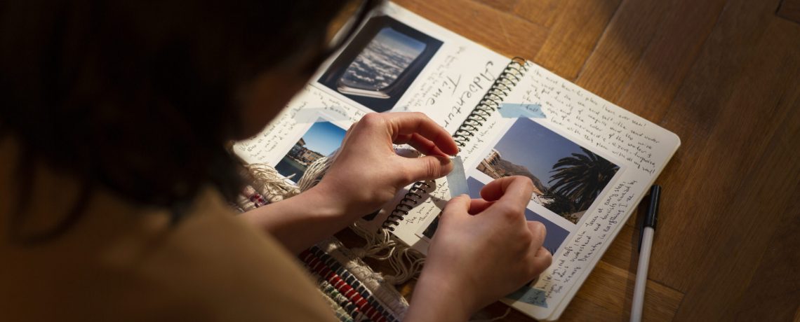 high-angle-woman-with-journal-home